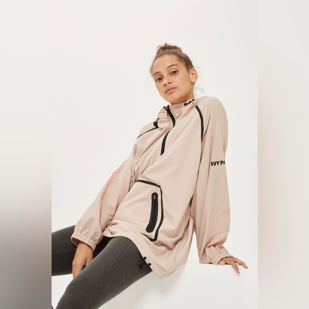 Ivy Park Women’s Perforated Mesh Hooded Pullover Jacket in Dusty Pink Size S